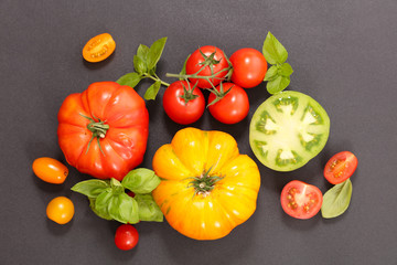 colorful tomatoes and basil