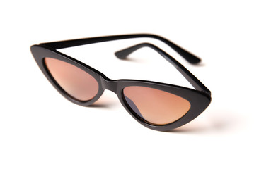 Black sunglasses with brown glasses isolated on a white background