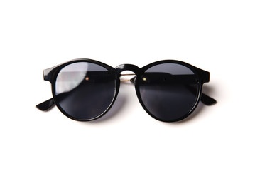 Stylish black sunglasses isolated on white background, top view © jalisko