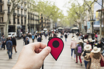 man with a red marker in Las Ramblas, Barcelona.