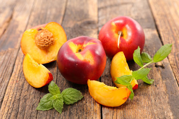 fresh peaches and leaf