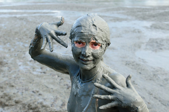 Woman taking Mud Bath In Crater Of Totumo Volcano Near Cartagena, Colombia