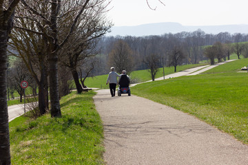 senior couple with motordriven wheelchair