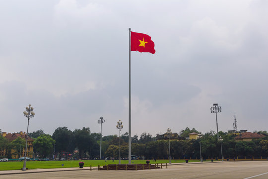 National flag of Vietnam Waving on the flagpole at Ba Dinh Square, Hanoi, Vietnam