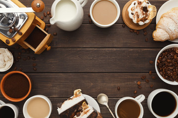 Various coffee cups and sweet pastry on vintage wooden table, to - obrazy, fototapety, plakaty
