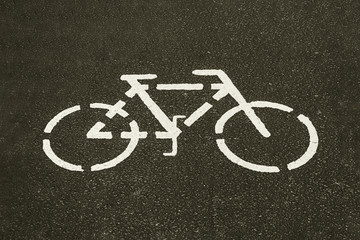 Bicycle sign on the asphalt