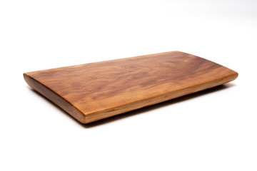 Isolated cutting board for use as a background.