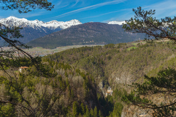 Picturesque view on the Sanctuary of San Romedio that is located on a steep rocky spur in the...