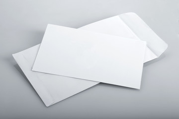 White Envelope and Invitation Card Mockup - obrazy, fototapety, plakaty