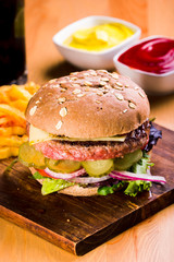 hamburger with cheese and pickles