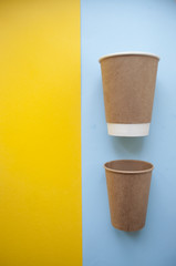 Paper cup on bright background.