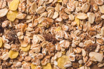 Oatmeal flakes as background. Healthy breakfast concept.