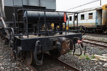 Fototapeta na wymiar Old rusty trains on abandoned railway