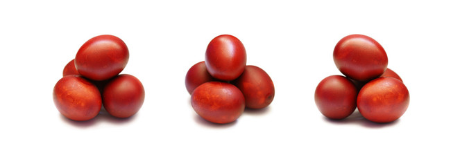 Collection of red dyed easter eggs hand painted isolated on white background. Onion  husk of the paint. Set of nine eggs, three pile