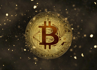 bitcoin logo in the dark background