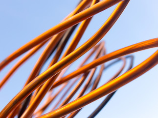 Copper wire against the blue sky
