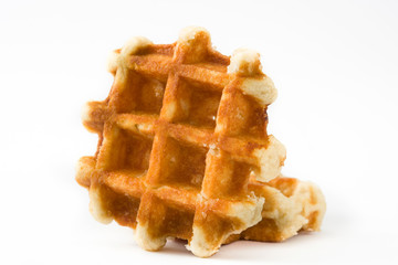 Belgian waffles isolated on white background. 