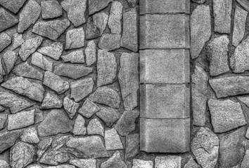 Stylish stone wall background in black and white