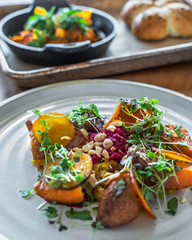 Vegetarian sweet potato salad with greens