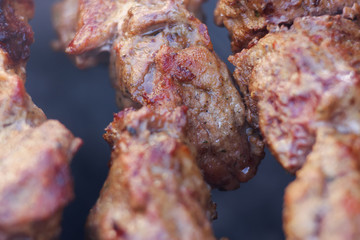 Excellent fresh juicy pieces of meat shish kebab fry on charcoal grill. Roast the meat close up