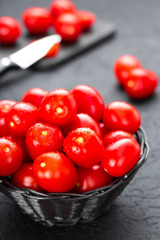 Tomatoes. Fresh tomatoes in basket on table