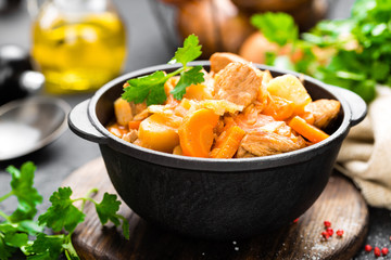 Meat stew with vegetables. Braised meat with cabbage, carrot and potato