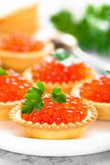 Tartlets with red salmon fish caviar, salmon caviar. Caviar