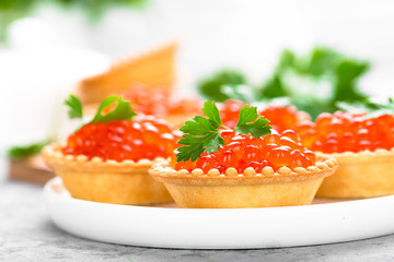 Tartlets with red salmon fish caviar, salmon caviar. Caviar
