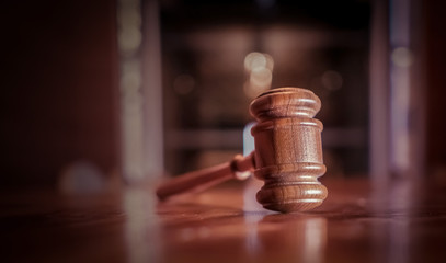 Legal law concept image, gavel on desk in court room
