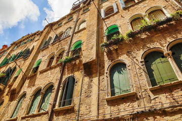 Historic architecture with old medieval buildings in Venice, Italy, Europe.