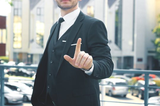 Close Up.businessman Showing Index Finger Up