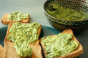 Toasted bread with guacamole. Homemade  avocado dip with dill.