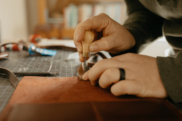 Man Artisan Handmaking A Lather Wallet