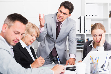 Manager expressing dissatisfaction with teamwork