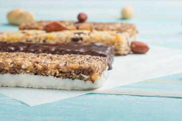 Delicious lattices of granola on a blue wooden table