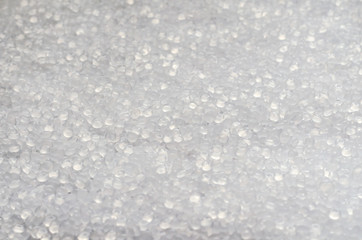 Polypropylene granule close-up background texture