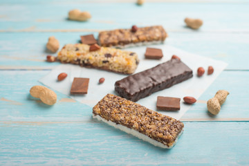 Delicious lattices of granola on a blue wooden table