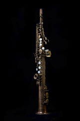 Soprano sax on black background