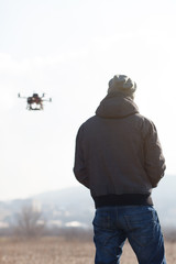 drone user piloting a drone