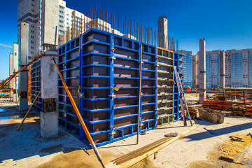 Home construction. Formwork for pouring concrete. Construction of a concrete house. Multi-storey construction. - obrazy, fototapety, plakaty