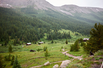 Fototapeta na wymiar Village in green mountain valley