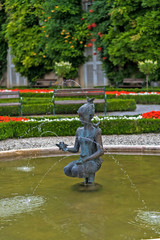Fountain "Girl with Birds"in Mirabell garden is the most beautiful park in Salzburg, Austria.
