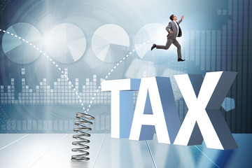 Businessman jumping from spring in business concept