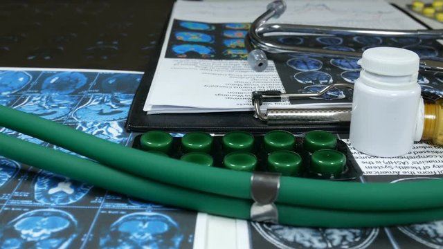 medical instruments and X-rays on the medical table