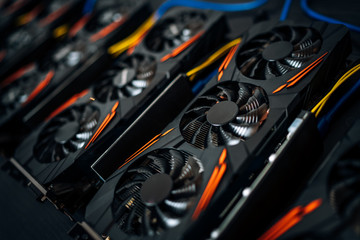 Close up details of graphics cards at cryptocurrencies mining rig. Modern technology
