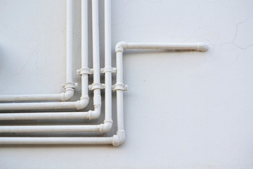 White water pipes on the wall