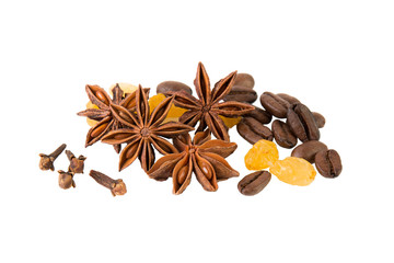 Variety of natural spices anise star with cloves, raisins and coffee beans on white background top view