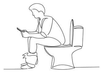 the man is sitting on the toilet with a tablet