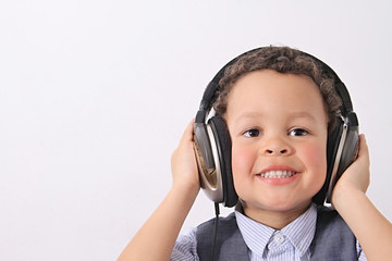 little boy with musical headphones