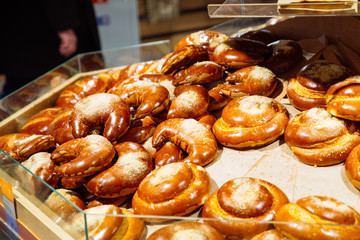 bakery shelf in store. grocery shopping. counter with bun